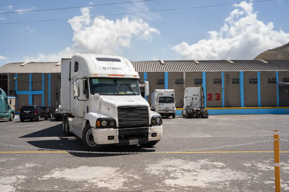 Forklift moving pallets between storage racks at the CTL consolidation center